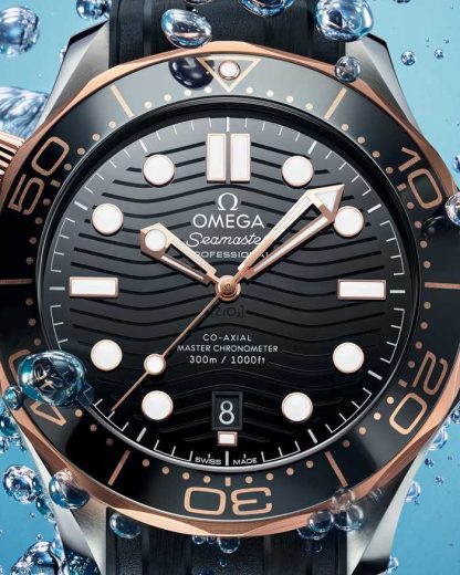 Omega Seamaster Diver 300M 42 mm, acero - oro Sedna™ con pulsera de caucho 210.22.42.20.01.002 - Imagen 3